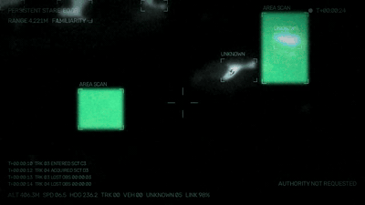 Close Enough drone feed excerpt: annotated overhead surveillance footage